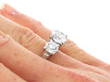 wearing 4.5 Carat Diamond Trilogy Ring in Platinum