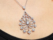 wearing Elegant Circular Floral Diamond Pendant