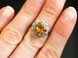Platinum Zircon and Diamond Cluster Ring on finger