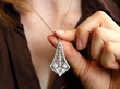 wearing Antique Filigree Diamond Pendant in White Gold