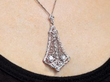 Antique Filigree Diamond Pendant in White Gold being worn