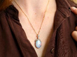 wearing Edwardian Opal Pendant in Yellow Gold