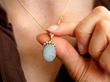 Edwardian Opal Pendant in Yellow Gold being worn