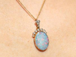 Opal Pendant in Yellow Gold being worn