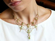 wearing Belle Epoque Peridot Necklace in Yellow Gold