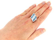 wearing 1920s Pear Cut Aquamarine Cocktail Ring