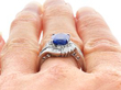 Sapphire and Diamond Halo Bypass Ring being worn