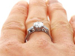Vintage 1.2ct Diamond Solitaire with Diamond Shoulders on finger