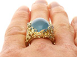 Naturalistic Cabochon Aquamarine Ring in Yellow Gold on finger