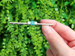 18ct White Gold Emerald Bar Brooch outside