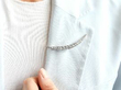 Graduated Diamond Crescent Brooch in Gold wearing