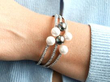 Large Pearl and Diamond Bangle in White Gold wearing