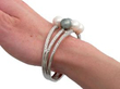 Large Pearl and Diamond Bangle in White Gold on wrist