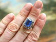 Step Cut Ceylon Sapphire and Diamond Ring on finger
