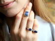 wearing gemstone rings