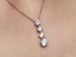 4 Diamond Drop Pendant Necklace in Platinum being worn