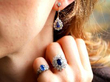 wearing sapphire rings and earring