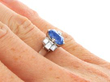 Oval Sapphire Ring with Baguette Diamonds on hand