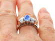 Sapphire Ring with Baguette Diamonds on finger