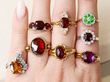 gemstone rings on hand