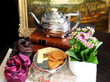 silver teapot and tazza