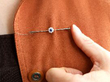 sapphire diamond bar brooch being worn