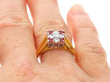 ruby and diamond yellow gold ring on finger