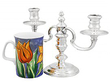 Silver Candelabra with 2 Arms next to a mug
