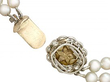 Double strand pearl necklace with clasp underside