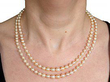 Double strand pearl necklace with clasp wearing