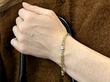 wearing gold diamond bracelet