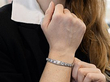 wearing a pearl and diamond braclet