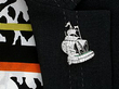 wearing a diamond ship brooch