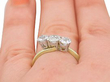 trilogy ring on hand