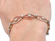 wearing ruby and diamond bracelet