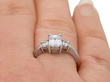 Emerald Cut Trilogy Ring Wearing 