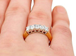 emerald cut anniversary band wearing