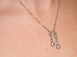 Diamond Bow Necklace being worn
