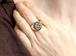 onyx signet ring on the hand