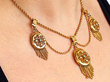Three Locket Necklace on Neck