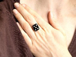wearing onyx and diamond dice ring