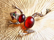 garnet frog in gold