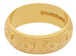 vintage gold wedding band on hand