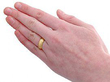 wearing gold wedding band