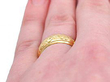 22ct wedding band on finger