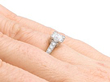 claw set engagement ring on the finger