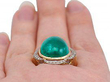 Cabochon Cut Gold Emerald Ring on finger