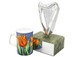 Harp Trophy in Sterling Silver next to a mug
