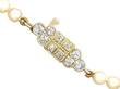 Single Strand Pearl Necklace with a Diamond Clasp