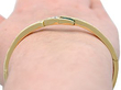 Emerald and Diamond Bangle Being Worn